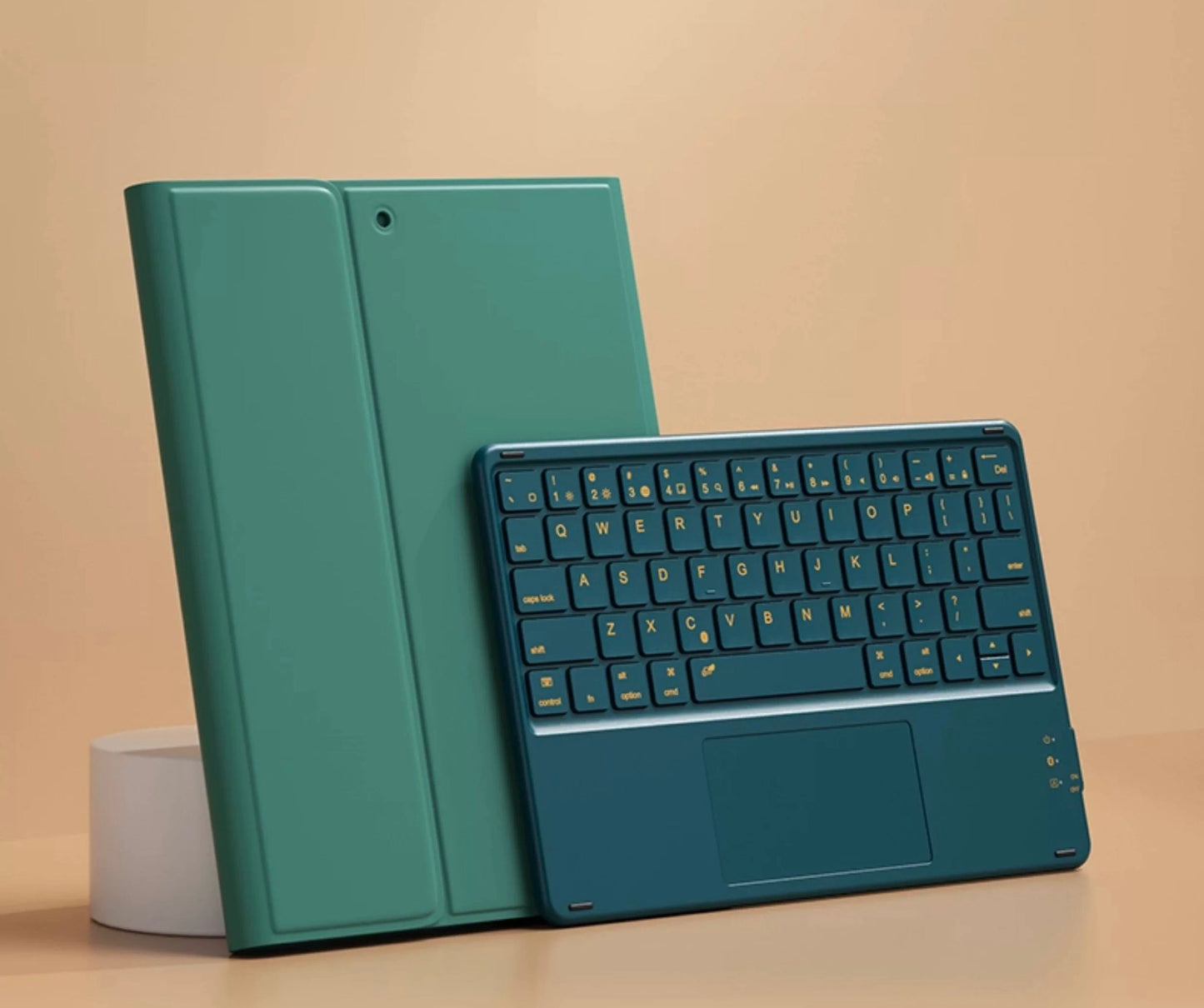 iPad with pink keyboard case on desk
